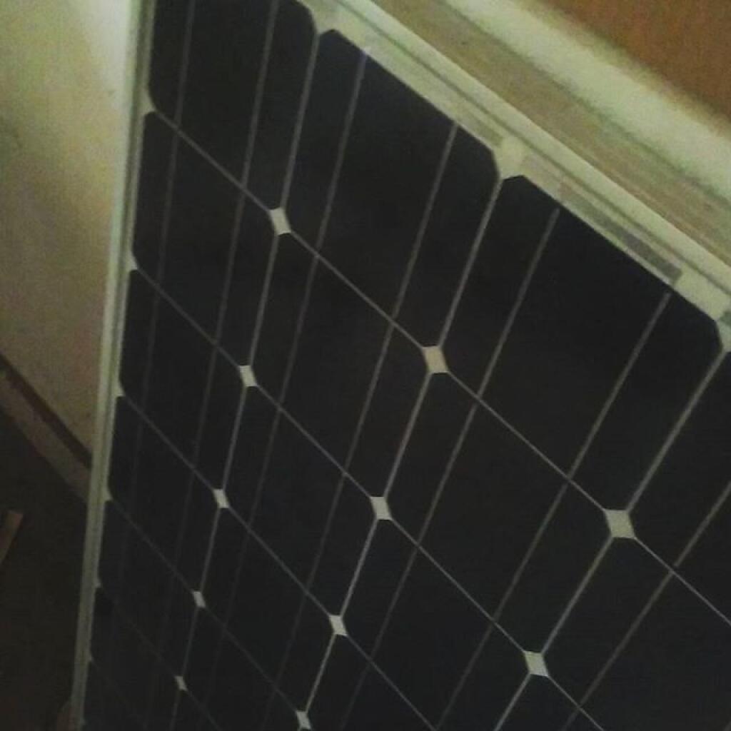 Photo: 100 watt solar panel Photo: 100 watt solar panel