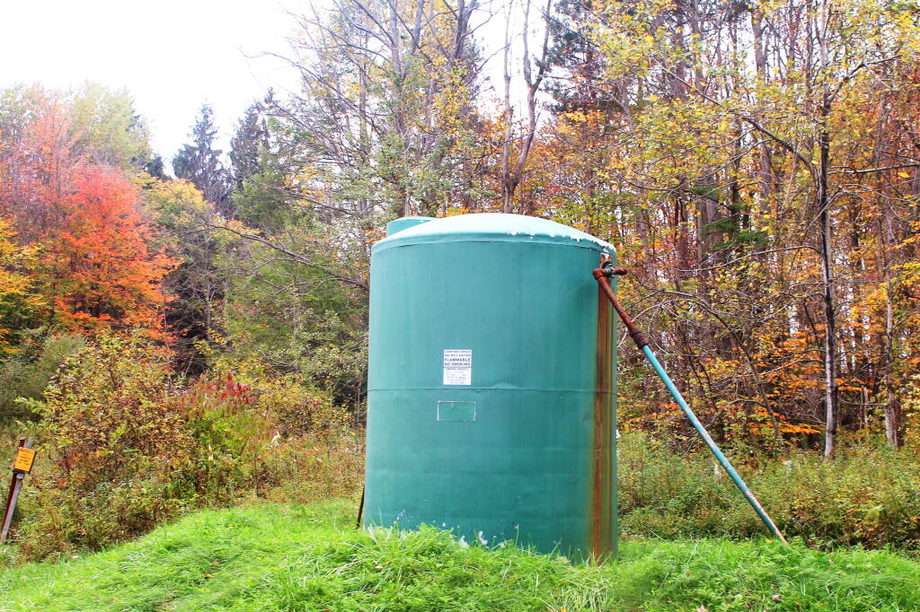 Photo: Big Condensate Tank Next To Natural Gas Well Photo: Big Condensate Tank Next To Natural Gas Well