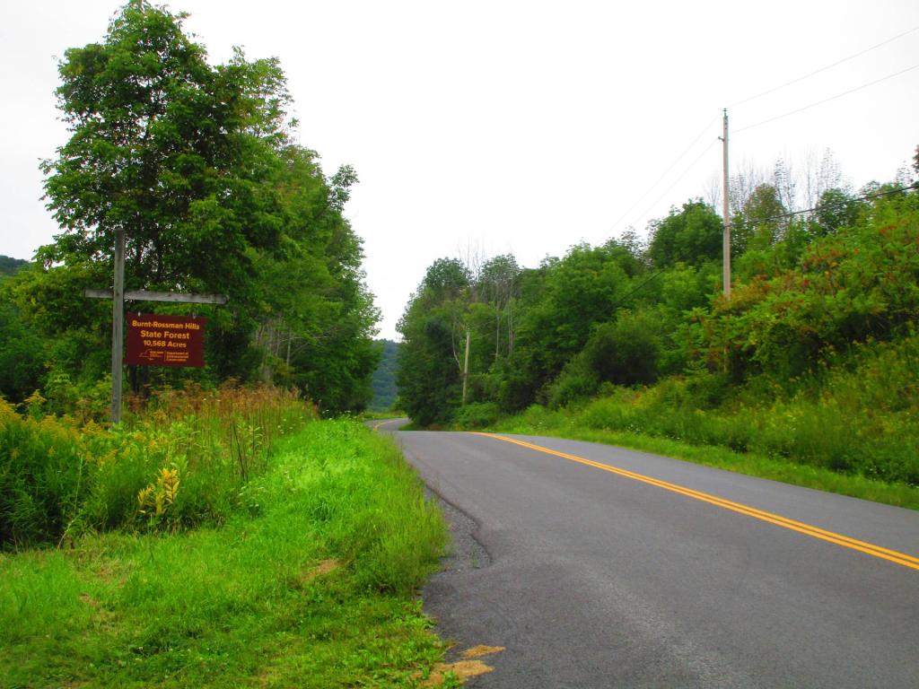 Photo: Burnt Rossman Sign [Expires September 15 2026]
